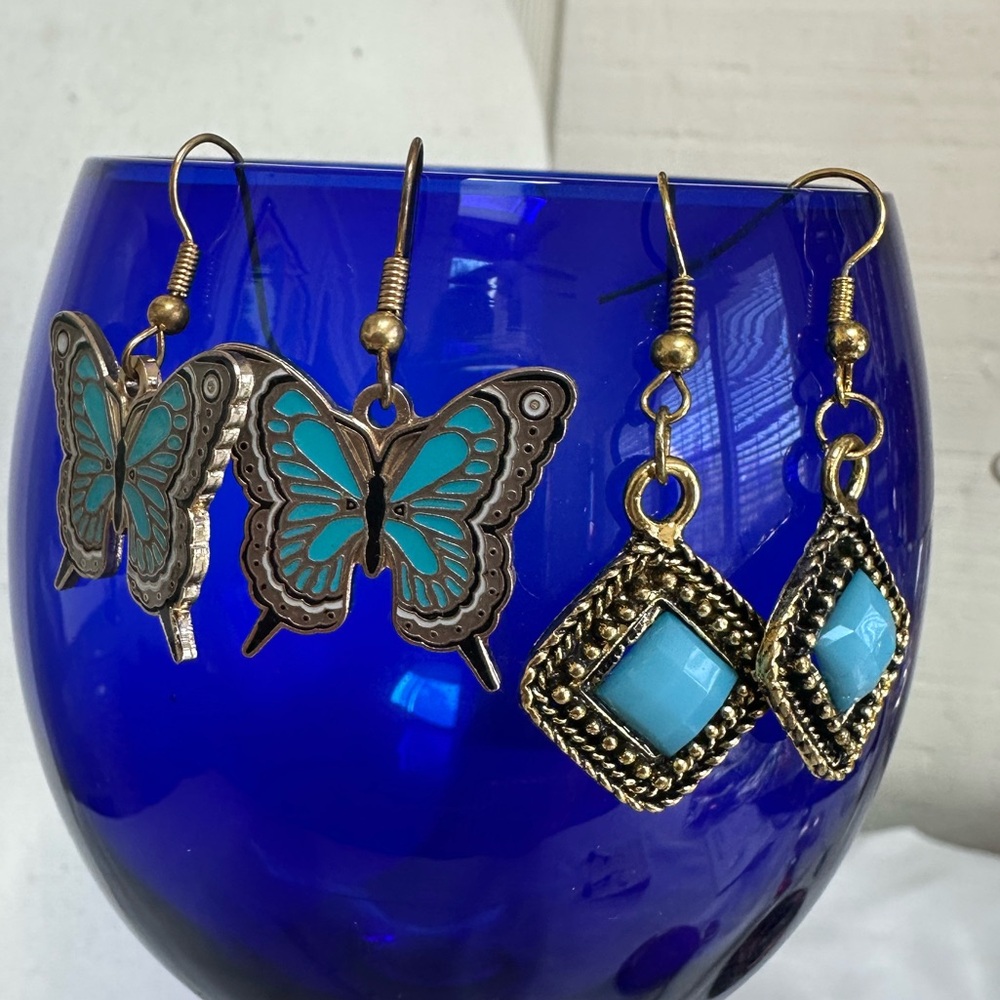 Two pair petite style goldtone and blue accent earrings